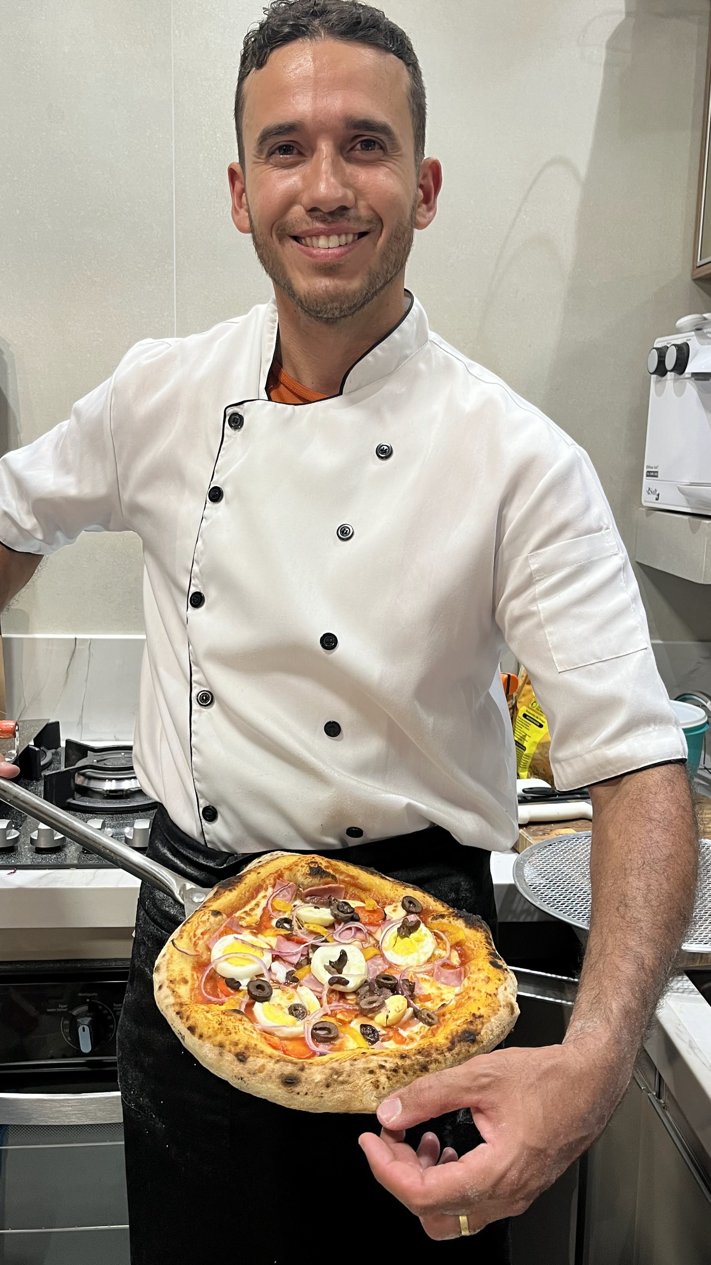 Paulo, pizzaiolo da Paollo Pizza